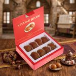 Open red Kafkas Kestane Şekeri gift box with candied chestnuts